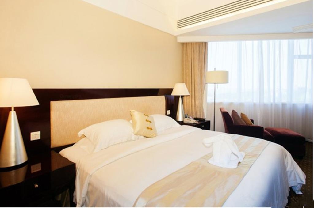 Tienyow Grand Hotel Haikou  Rum bild